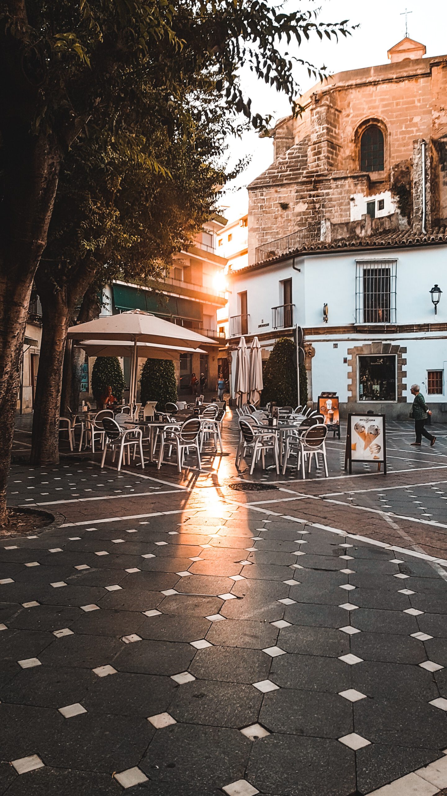 Terrace on the street and rising sun